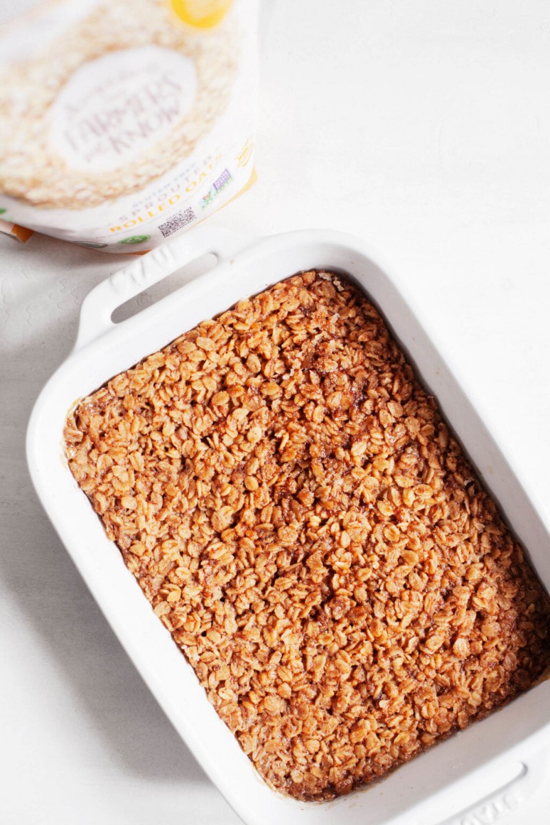 A rectangular baking dish, filled with a whole grain, plant-based breakfast.